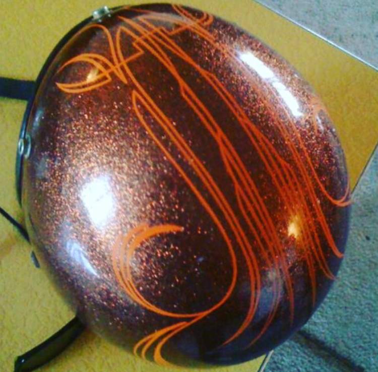striped and swirled sparkly motorcycle helmet