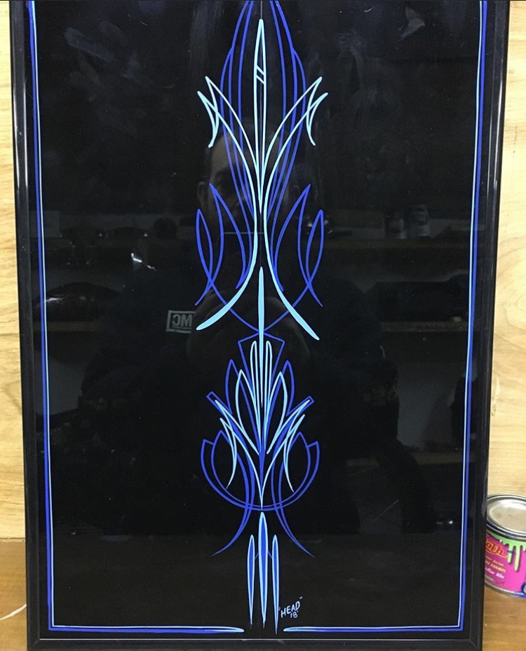 pinstriped on glass and framed